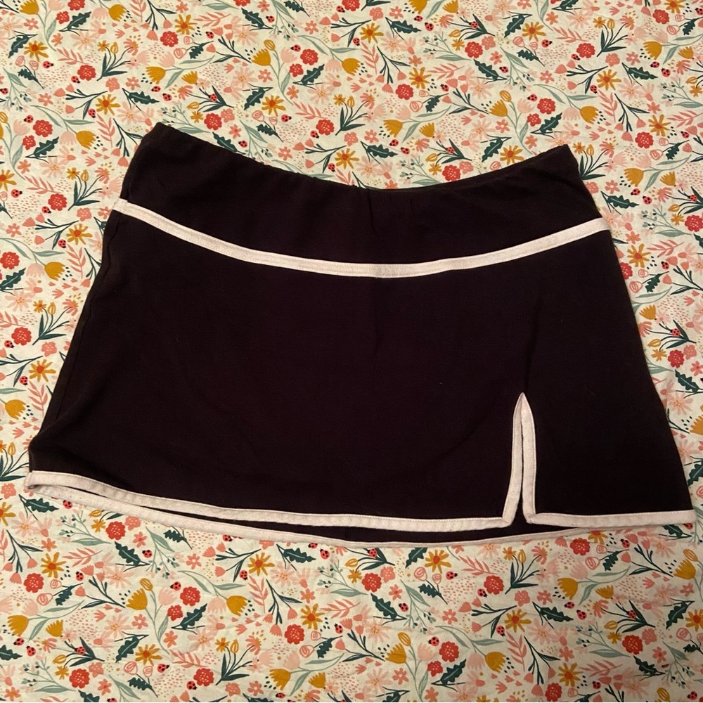 Black and pink mini tennis skirt